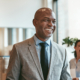 African American Businessman Laughing While Walking Through A Modern Office