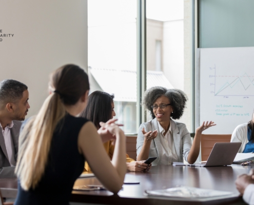 Nonprofit board reviewing financial reports to catch red flags before a major deficit