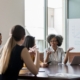 Nonprofit board reviewing financial reports to catch red flags before a major deficit